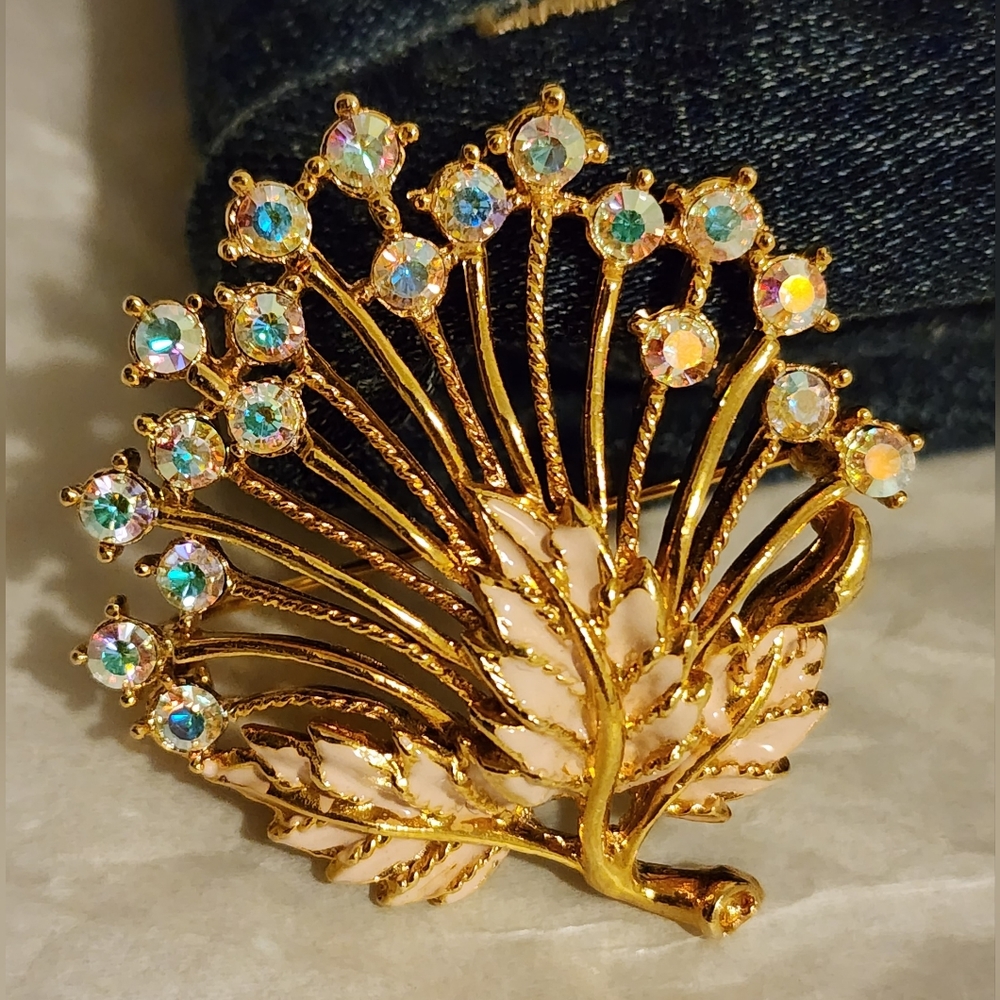 M. Jent sparkling rhinestones and light pink enamel brooch.